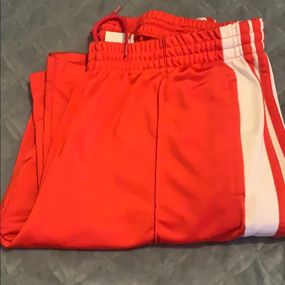 Adidas adibreak track pants in red size L